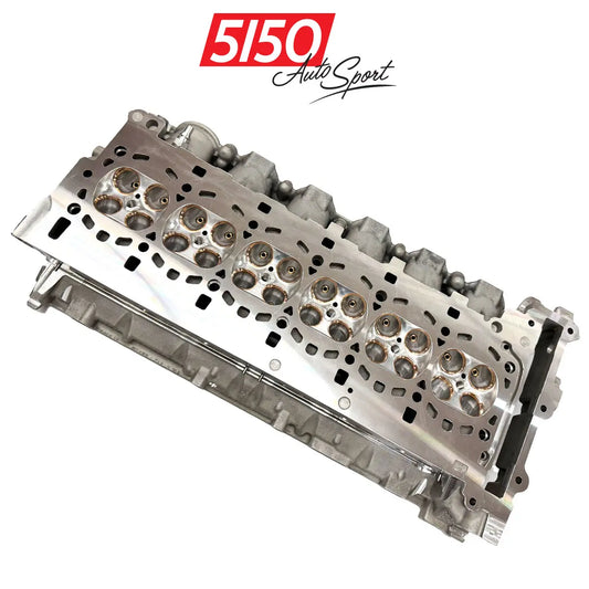 BMW S58 performance valve seat replacement by 5150 AutoSport, showing a machined cylinder head with upgraded valve seats for improved valve seats.