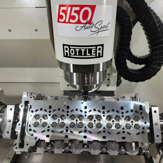 BMW S58 engine cylinder head after CNC performance machining for greater airflow and power.