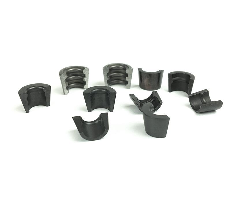 A set of 6mm black valve locks on a white background.